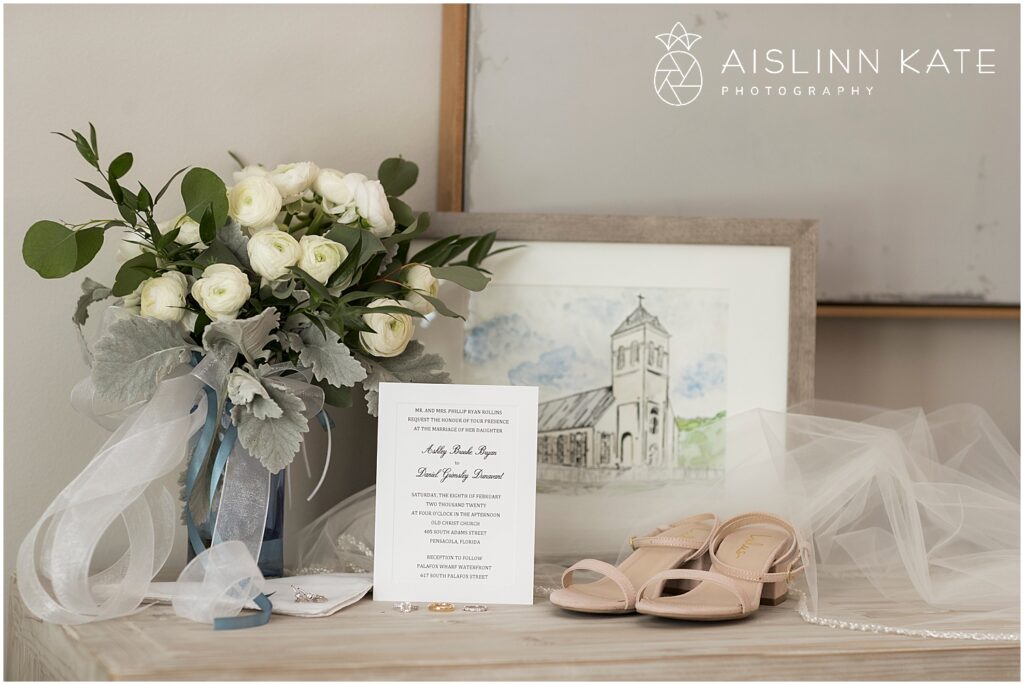 Start Gathering Wedding Ideas is this look of Invitation, florals, Old Christ Church drawing, wedding shoes in Pensacola Florida for Palafox Wharf Waterfront is great example 