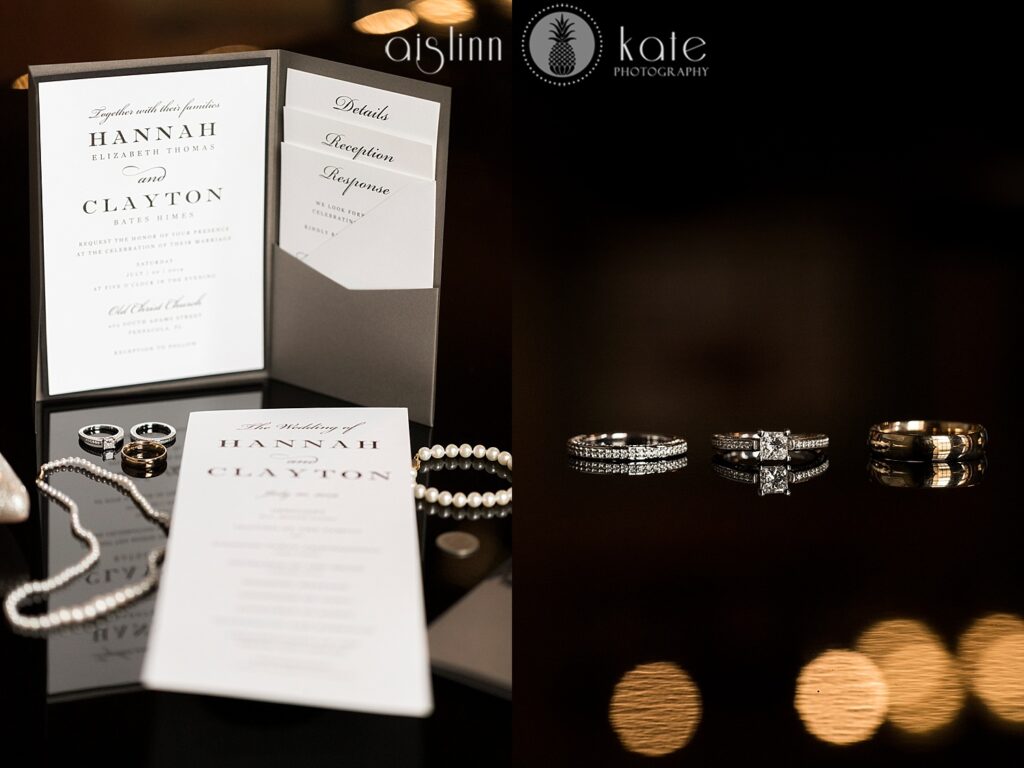 Very organized Invitation Suite and rings at Palafox Wharf Waterfront Wedding Venue