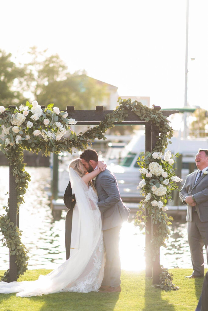 romantic ceremony in march, the beginning of spring showing a shoulder month of the best months for your wedding in pensacola florida