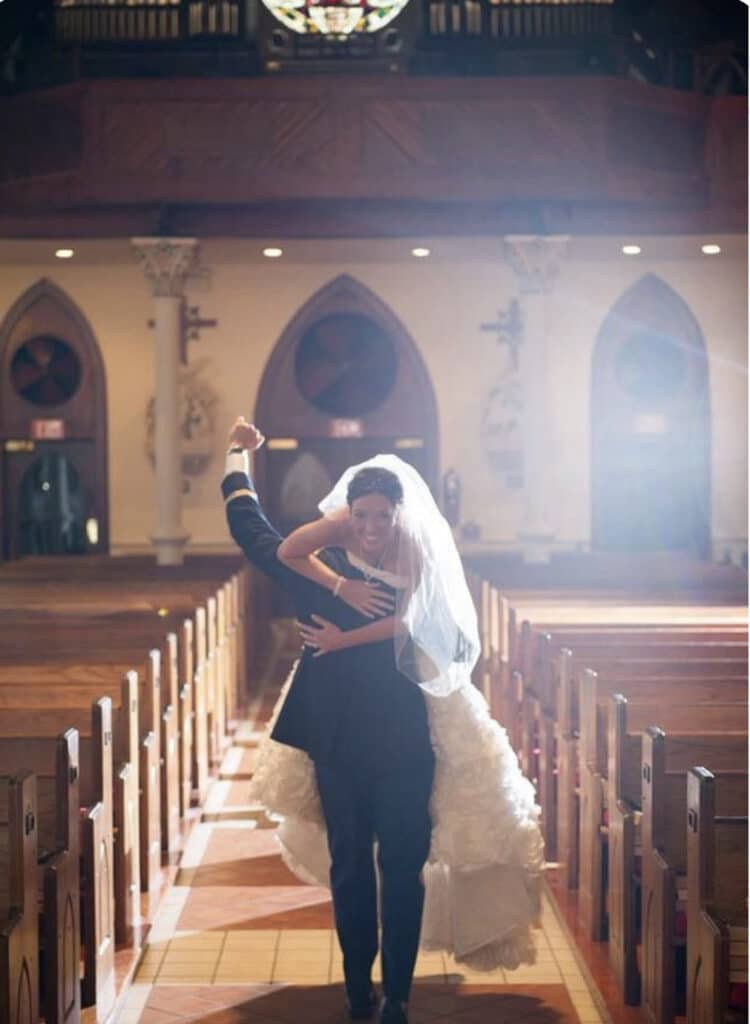 NEED HELP NAVIGATING WEDDING DAY SPOTLIGHT JITTERS?  Bride over Groom's Shoulder at St. Michael's Catholic Church and then on to Palafox Wharf Waterfront in Pensacola, FL