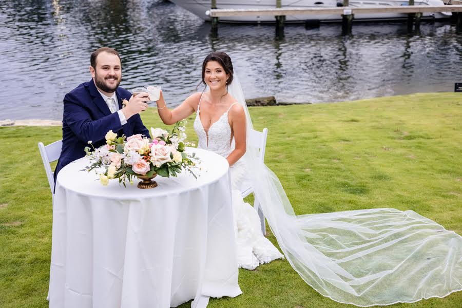 Wedding Couple enjoying a cocktail during their Wedding Reception . photo by Wendy Wilson Photography near Pensacola and Destin https://www.thegreenhouseatarrowsfarm.com/ https://butlerscourtyard.com/
