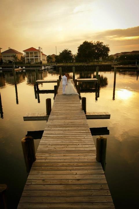 Golden hour wedding dock photos of couple in Pensacola in downtown walkable to hotels Palafox Wharf Waterfront on the marina harbor and near Destin Florida
https://617palafoxwharf.com/ https://thehiddenabbey.com/