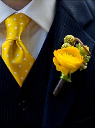 Striking Yellow tone tie and floral on lapel Palafox Wharf event Pensacola and Destin area https://www.antlerridgeweddings.com/ https://www.5familyranch.com/
