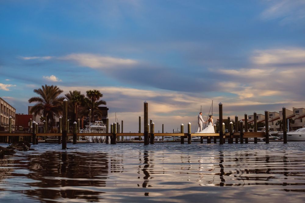 Micro Wedding Couple - Party of 30 guests - Couple walking on the Palafox Wharf Waterfront’s Dock in Pensacola and near Destin Florida