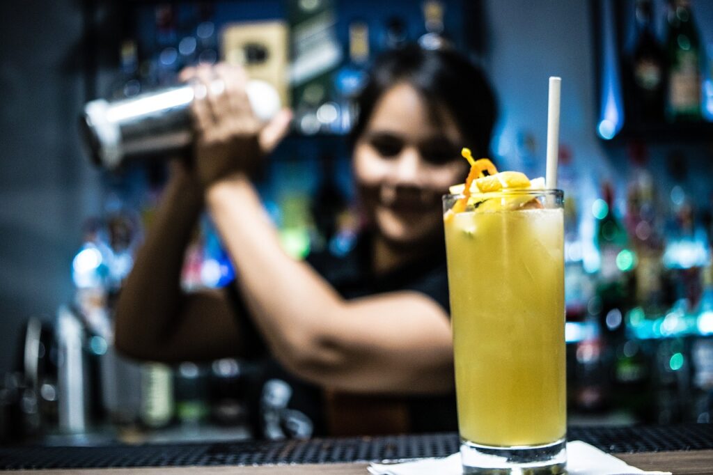 Bartender making drink