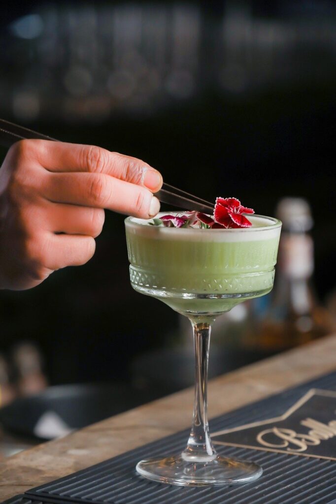 Green drink with red flower