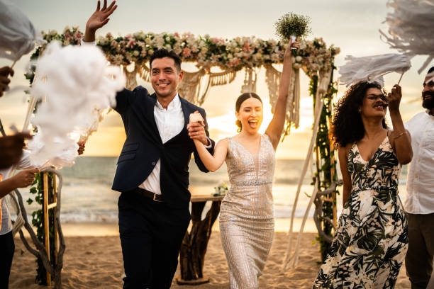 Couple married at Pensacola Beach and then to Palafox Wharf Waterfront for Reception about 15 minute travel time near Pensacola and near Destin Florida