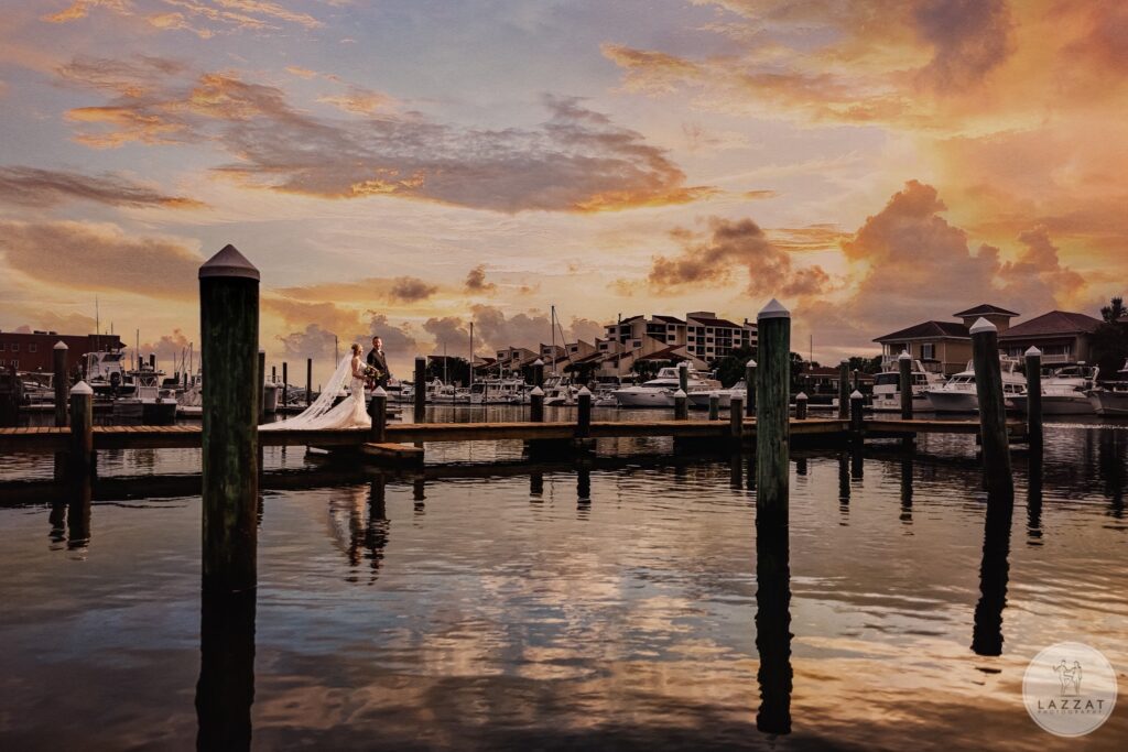 Pensacola near Destin Florida with couple strolling on the downtown centrally located Wedding Venue known as Palafox Wharf Waterfront