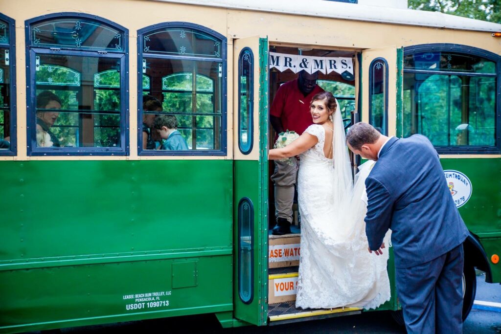 Events at Palafox Wharf Waterfront Downtown NWFL Pensacola FL
Vintage Trolley in Pensacola Florida with Bride and Groom and next on the timeline is their Second Line Dance