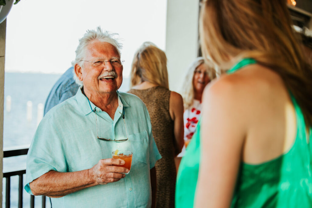 G&G Society member Dr. Harry Dillard sips on the “Orange Oasis,” a cocktail crafted with Blade and Bow bourbon by mixologist Katie Garrett.