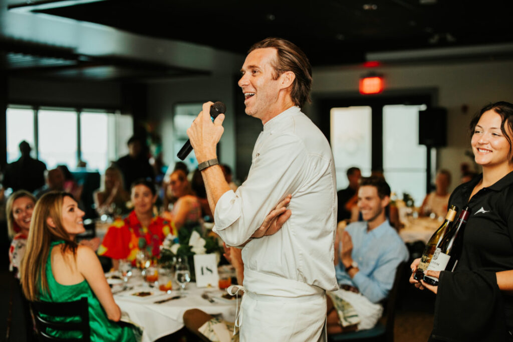 Chef talks about his yellowfin tuna dish at the event