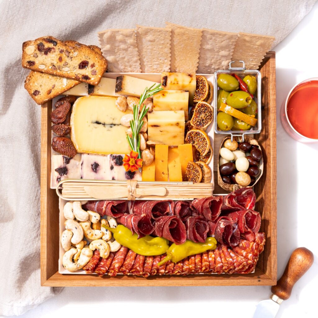 Pensacola, Destin, or the greater Southeast Personalized wooden charcuterie board with cheese and grapes