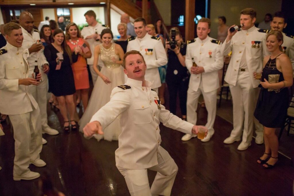 Event Wedding venue Pensacola near Destin Florida Solo Dance with guests in a circle watching on Palafox Wharf Waterfront's dance floor