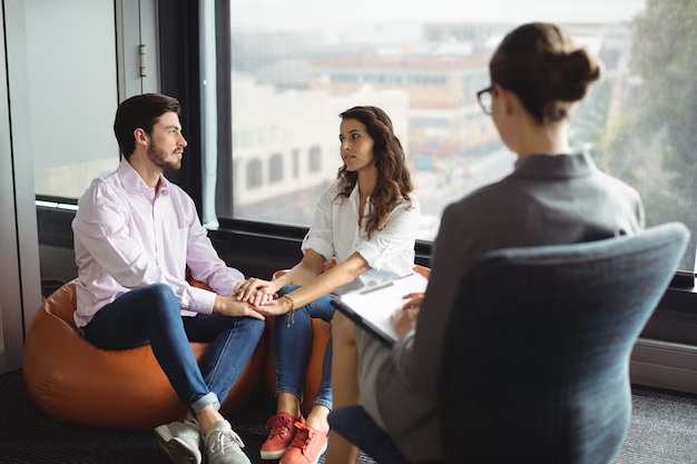Guide to Prenuptial Agreements for Engaged Couples with a couple seeking answers about a prenatural agreement