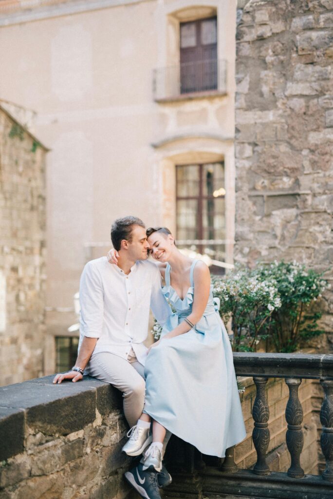 Event Venue in Pensacola Florida showing couple in love and she is wearing a blue dress with white tennies and he is in beige pants and white shirt