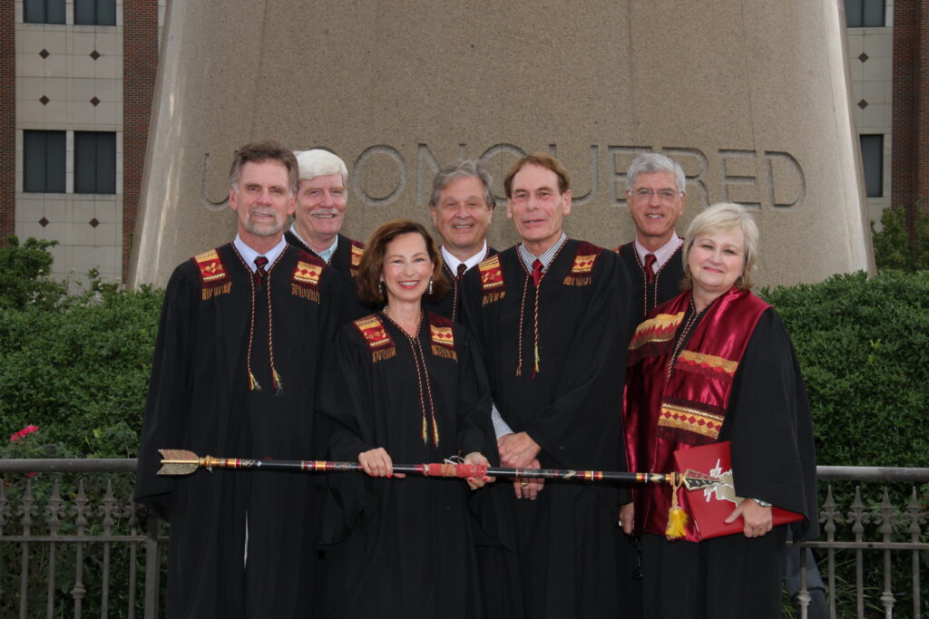 Fire Lighting Ceremony #1 before the game with The Citadel. Peter and Sandy McDavid lit the fire with Andy, Joel, Kelly, and Charlie. Photo by: Ryals Lee