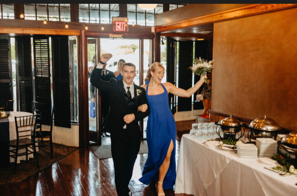 Food stations inside and outside the Palafox Wharf Waterfront Venue with tasty treats for wedding guests