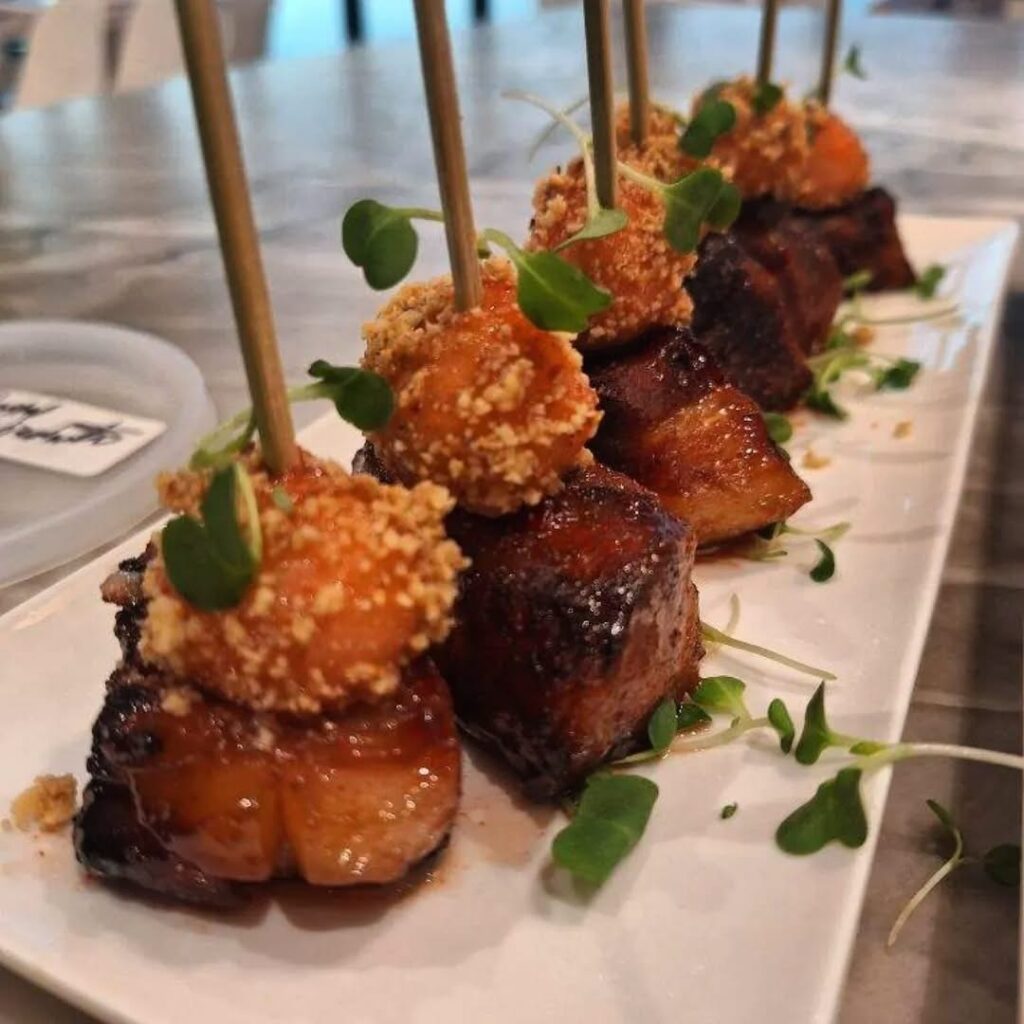 Emerald Coast Private Chefs’ Candy Apple Pork Belly Appetizer so Elevate Your Wedding with Farm-to-Table Menus and your guests will thank you