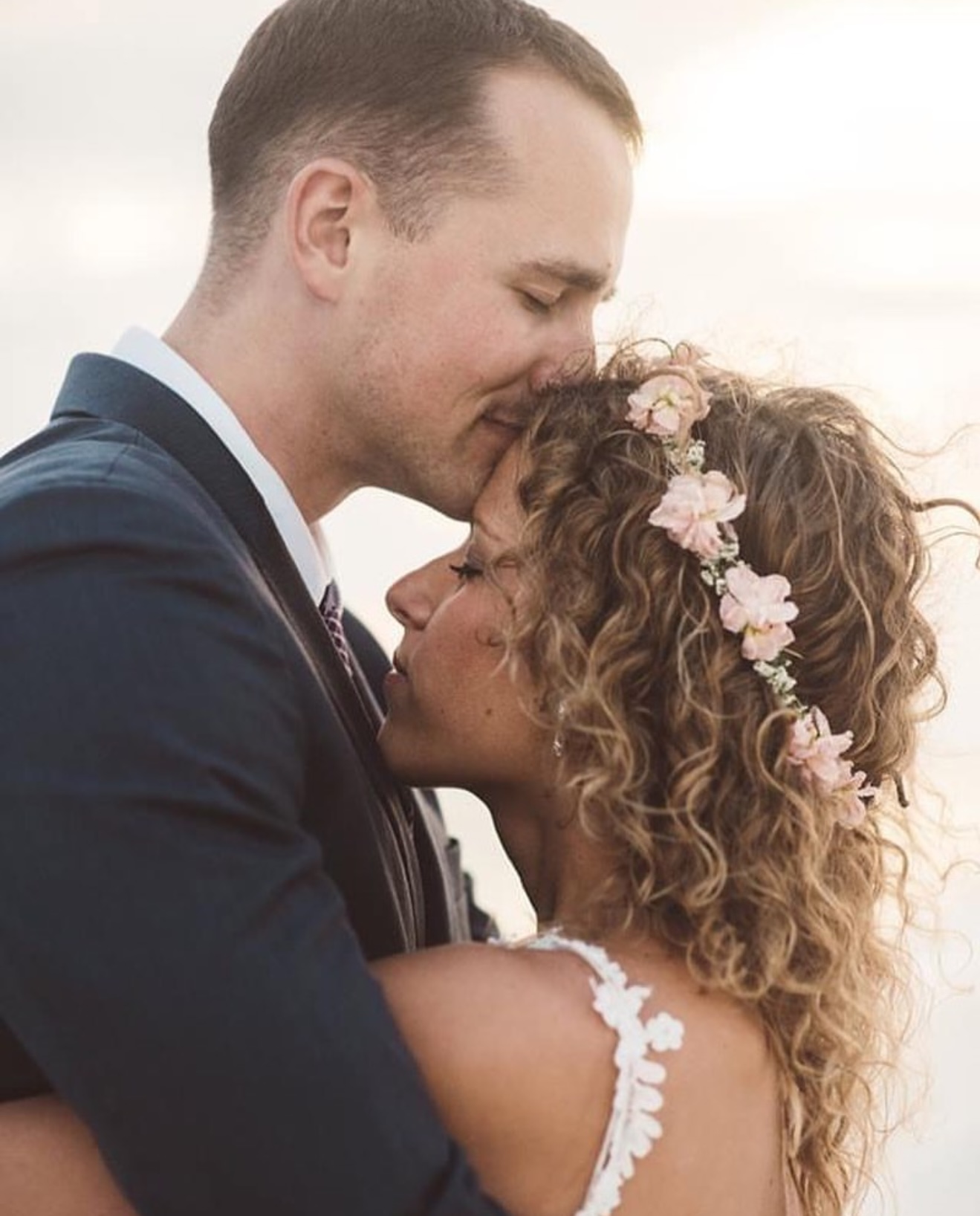 Couple embracing after Ceremony at Palafox Wharf Waterfront