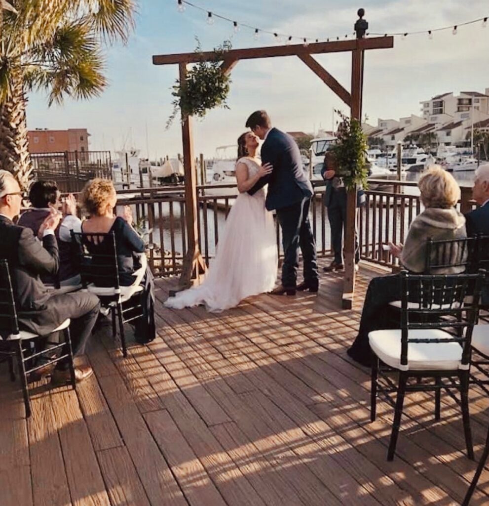 Smaller 30 guests for private Ceremony on the Deck prior to the rest of the guests arrive for Celebration later. Photo by Carmen Jones Photography