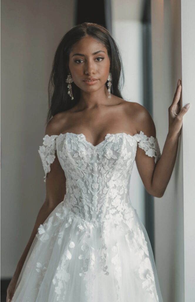 Pensacola FL Wedding Venue showing Essense of Australia bridal dress of tulle wedding dress with 3D floral appliques that would be perfect for a garden wedding and outdoor wedding.