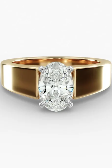 Very sleek wedding ring for either bride or groom with large diamond and gold metal and is a strong statement for a wedding ring