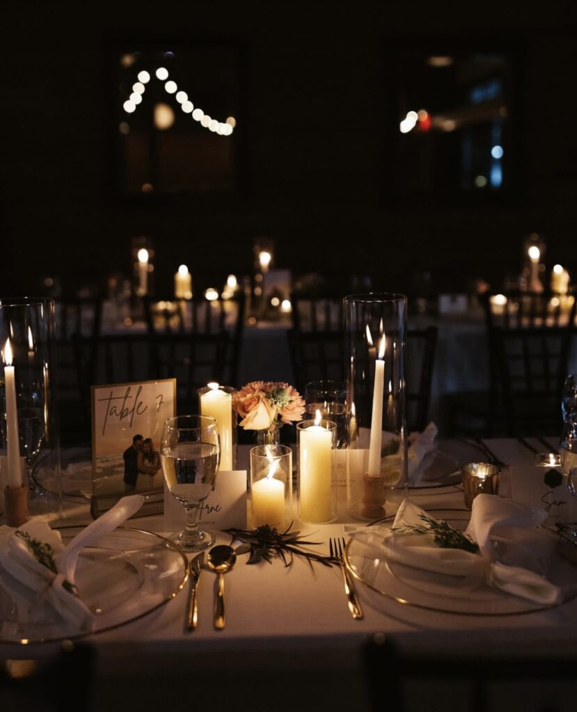 Wedding Venue Pensacola in Pensacola FL wedding venues showing candlelit tablescape for wedding dinner and this couple thought that as an Engaged Couples Can't Get Enough of this Dreamy Southern Downtown Waterfront Wedding Venue