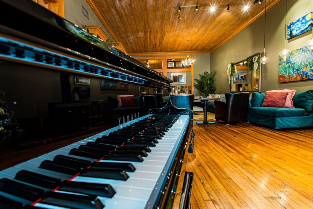 Wedding venues Pensacola FL—baby grand piano loft on Palafox Street, perfect for couples celebrating at Palafox Wharf.