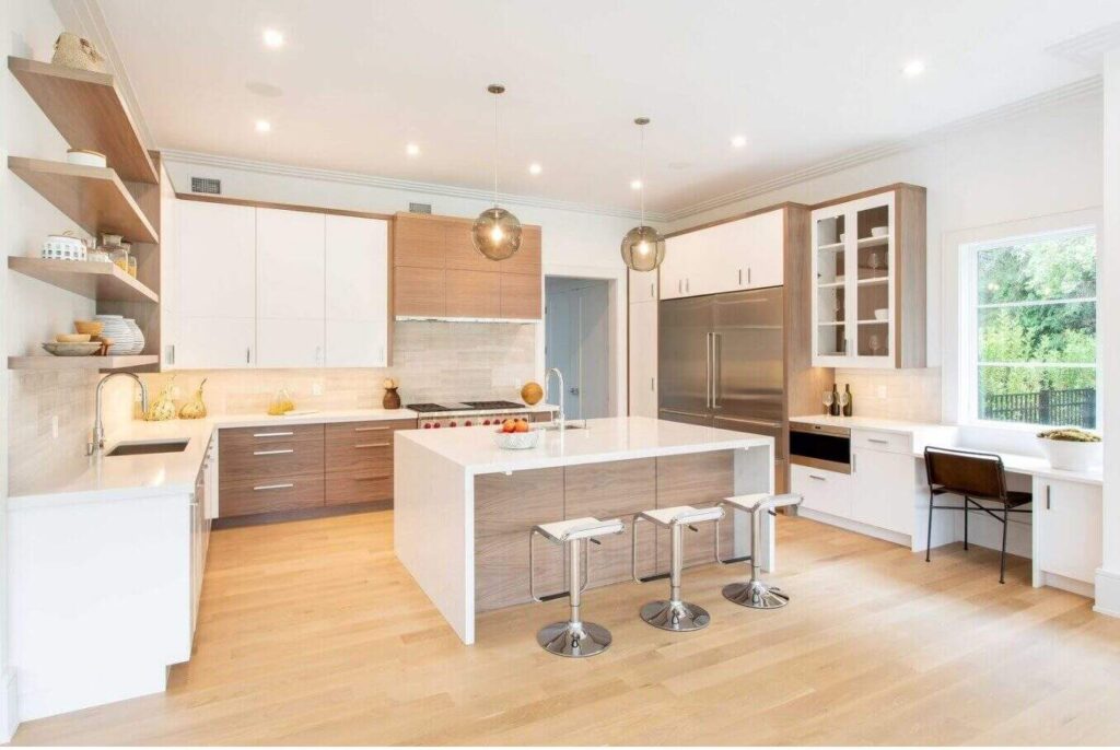 Couples looking for a pensacola wedding venue and in this photo we have a beautiful kitchen in neutral tones
