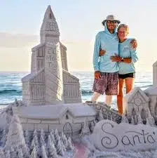 enjoy building a sandcastle together near the blue water after you have viewed pensacola wedding venues