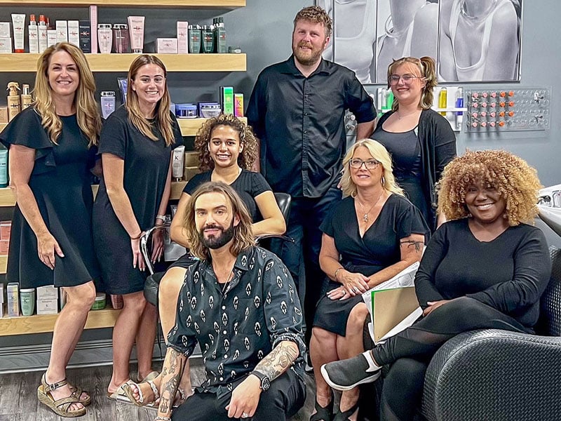 Stylish salon team at a chic place in Mobile, AL for beauty services and maybe they travel for wedding venues Pensacola FL, perfect for bridal prep.