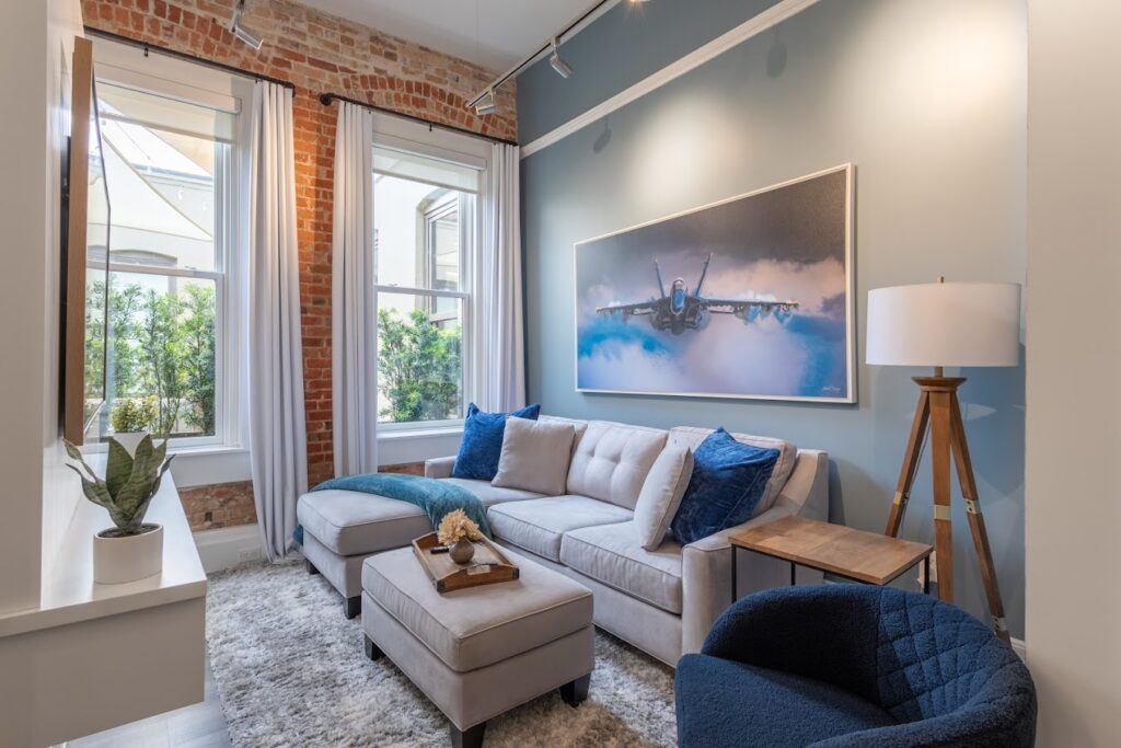 Cozy downtown suite near wedding receptions in Pensacola FL with modern decor and seating