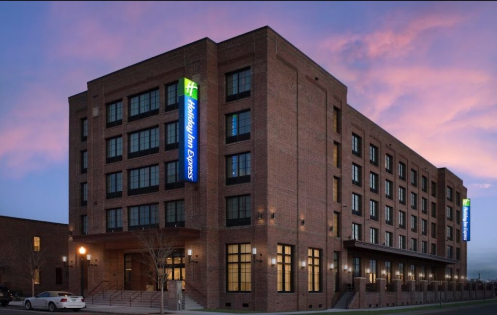 Hotel near wedding receptions in Pensacola FL with brick exterior at sunset