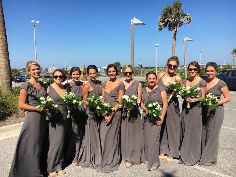 Wedding venue Pensacola with wedding party in gray