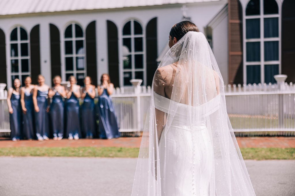 wedding venues pensacola wit bride in white dress, wedding party
