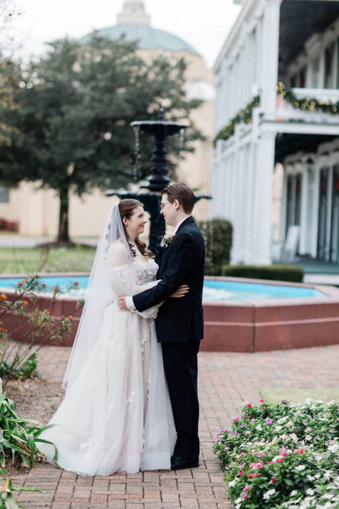 wedding venues near me with couple in front of a fountain